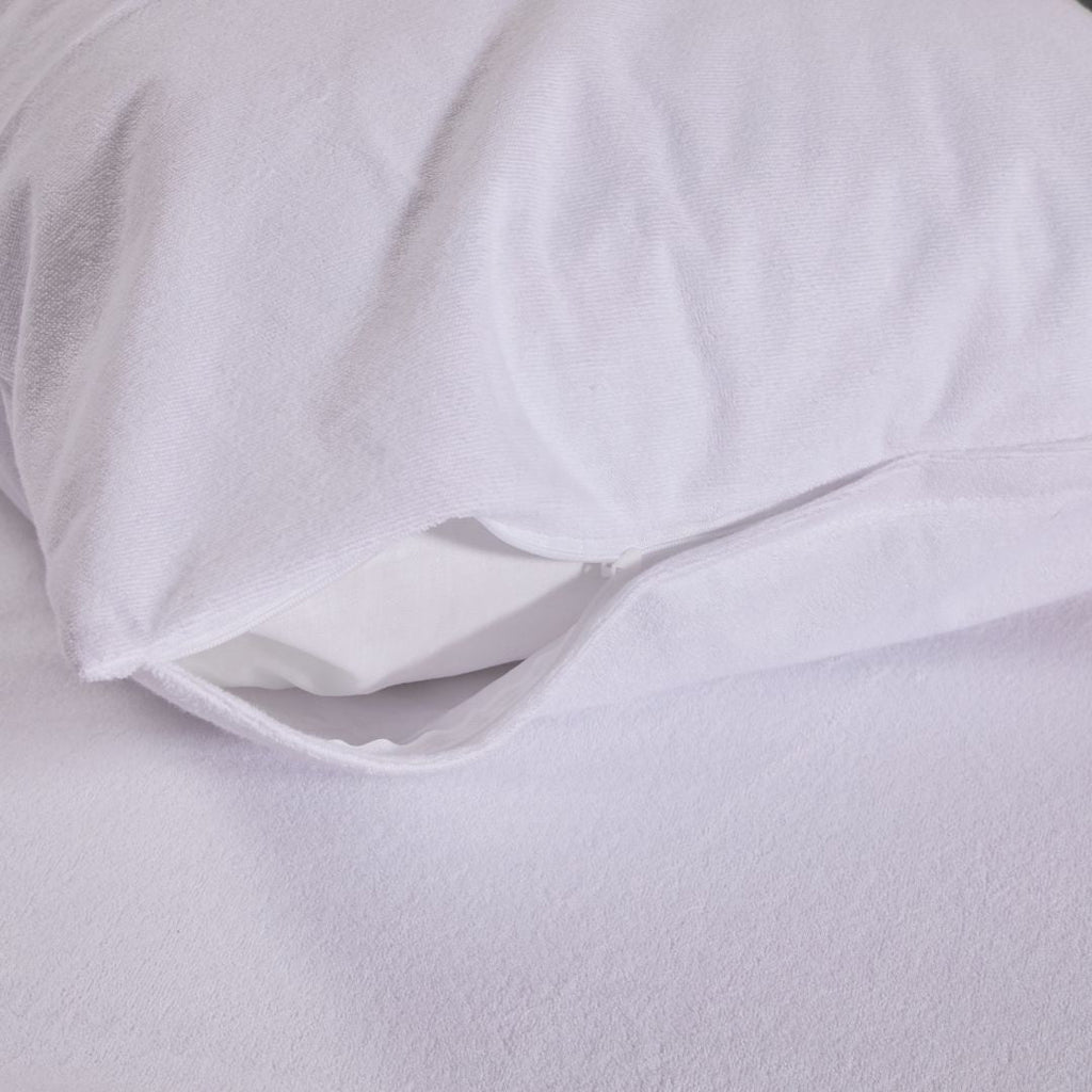 Close-up of a white textured fabric with a slight sheen.